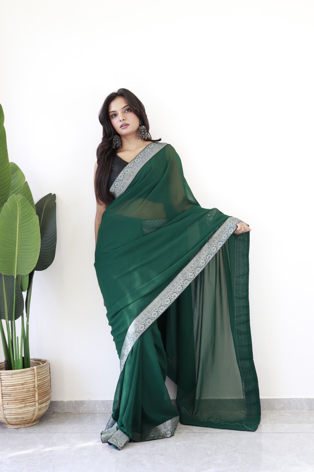 Dark Green Designer Georgette Saree with Silver Embroidered Border