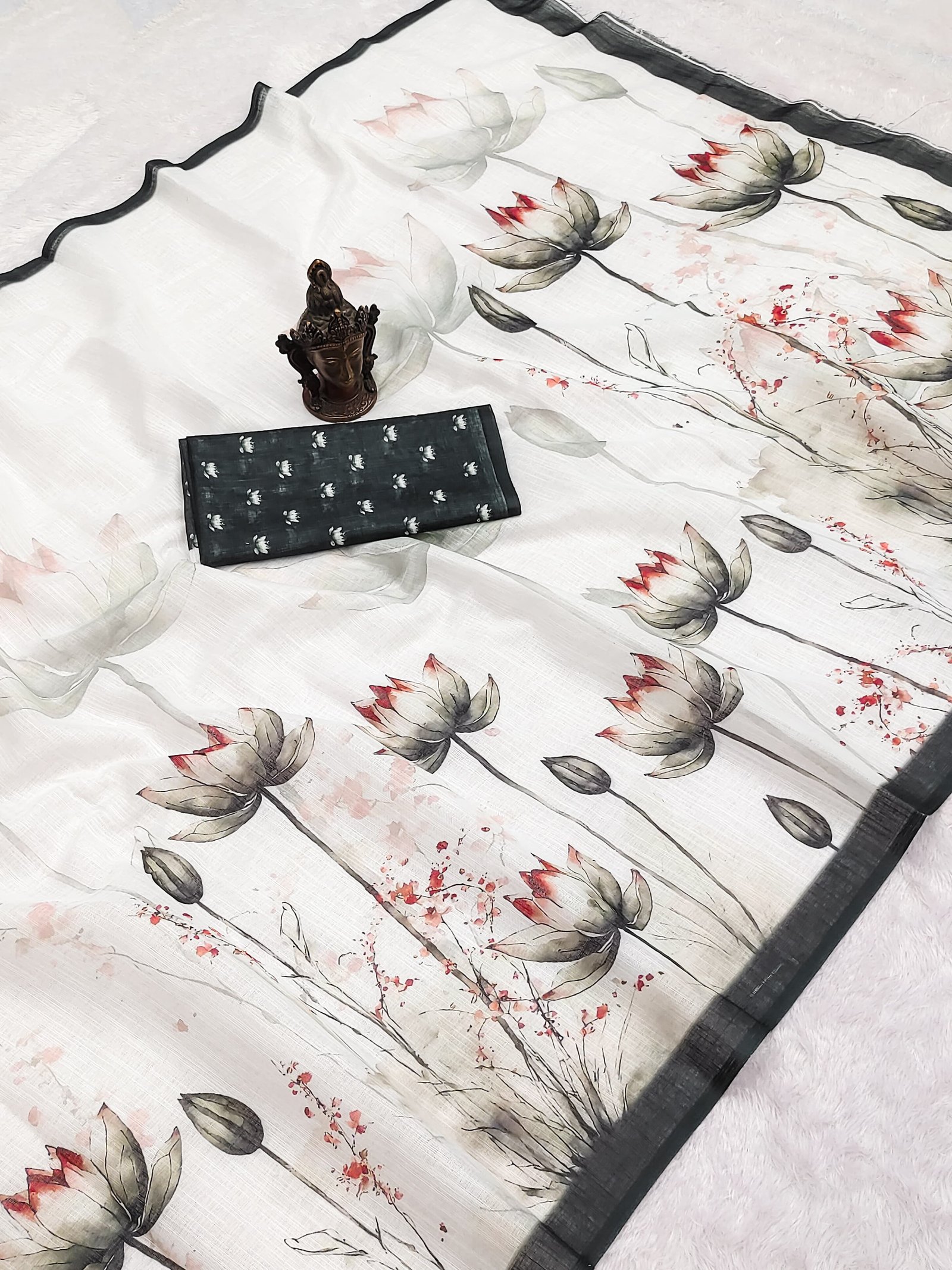 Elegant white organza saree with hand-painted-style lotus motifs